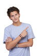 Handsome young guy pointing upwards against a white background