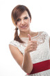 Photo: Young Caucasian woman showing thumb up Young Caucasian woman showing thumb up