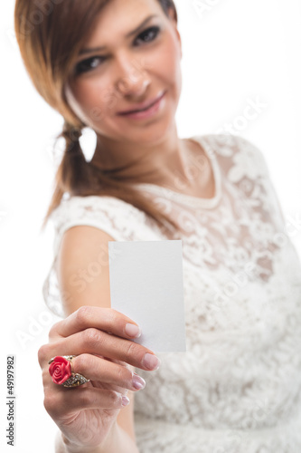 Photo: Beautiful woman presenting a business card Beautiful woman presenting a business card