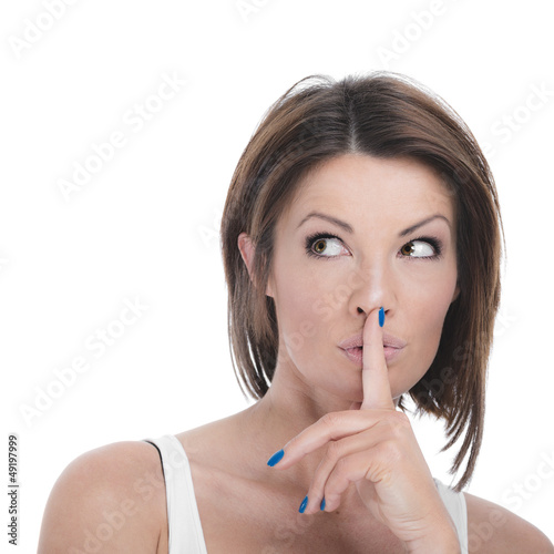 Photo: Playful woman making a shushing gesture Playful woman making a shushing gesture