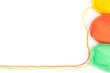 yarn skeins in yellow, orange, green colors on white background