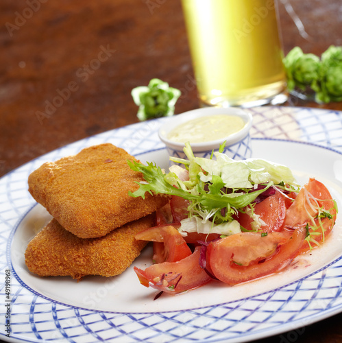 Photo: Schnitzel with salad Schnitzel with salad