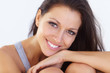 Photo: Portrait of a beautiful young woman with gorgeous eyes smiling a Portrait of a beautiful young woman with gorgeous eyes smiling a