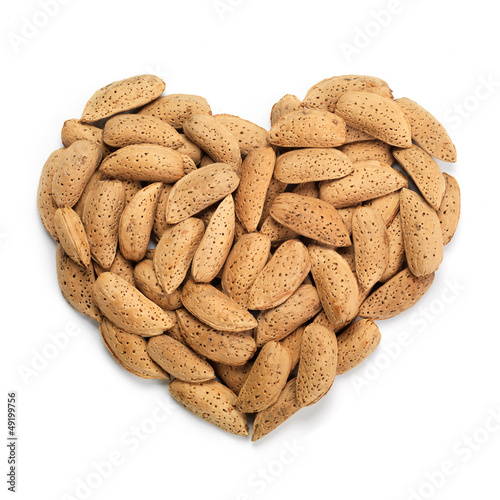 Photo: Almonds heart. Health concept. Almonds heart. Health concept.
