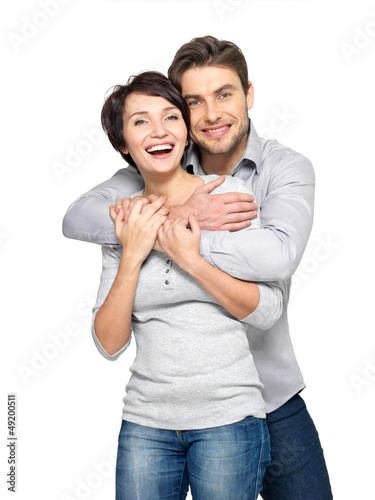 Photo: Portrait of happy couple isolated on white Portrait of happy couple isolated on white