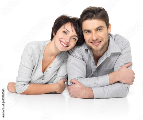Photo: Portrait of happy couple isolated on white Portrait of happy couple isolated on white