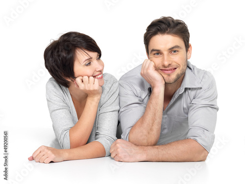 Photo: Portrait of happy couple isolated on white Portrait of happy couple isolated on white