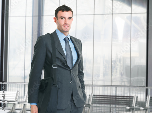 Photo: Business man carrying a computer bag Business man carrying a computer bag