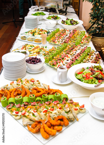Photo: Table with various delicious appetizer Table with various delicious appetizer