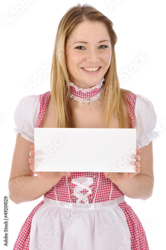 Photo: Junge Frau im Dirndl hält leeres Schild Junge Frau im Dirndl hält leeres Schild