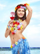 Photo: Woman in hawaii costume drink juice. Woman in hawaii costume drink juice.