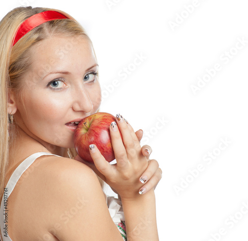 Photo: young blond woman and apple young blond woman and apple