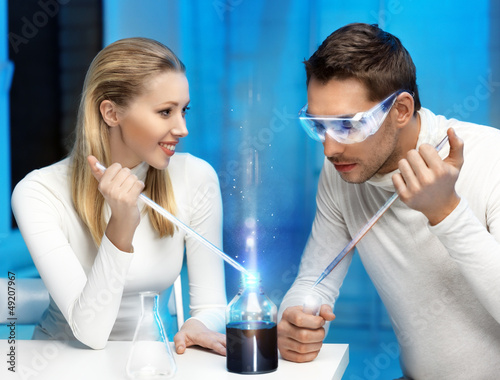 Photo: man and woman in laboratory man and woman in laboratory