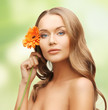 lovely woman with gerbera flower