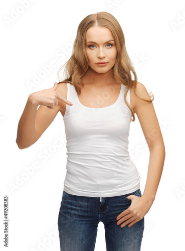 Photo: calm and serious woman in blank white t-shirt calm and serious woman in blank white t-shirt