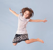 Photo: cheerful girl jumping cheerful girl jumping