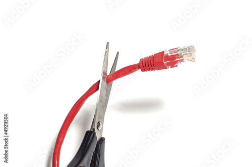 Photo: scissors cutting net cable: censorship concept scissors cutting net cable: censorship concept