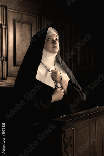 Photo: Devotion in a habit Devotion in a habit