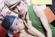 Studio portrait of young men and women in retro style