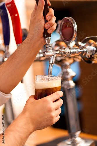 Photo: Filling glass with beer Filling glass with beer