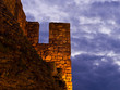 Fortress walls and heavy clouds