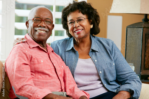 Photo: Portrait Of Happy Senior Couple At Home Portrait Of Happy Senior Couple At Home