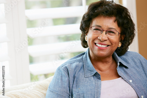Photo: Portrait Of Happy Senior Woman At Home Portrait Of Happy Senior Woman At Home