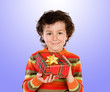 Beautiful child giving a present