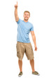 Happy man pointing - full length portrait on white background