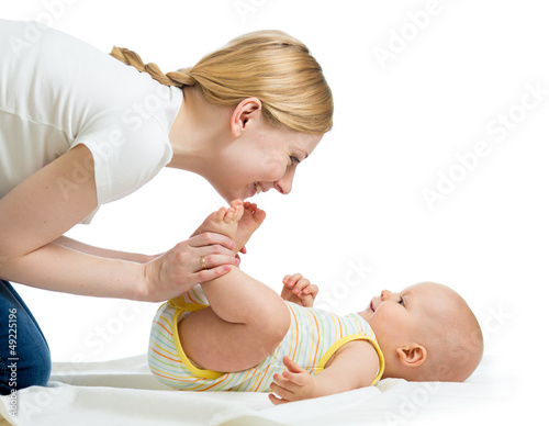 Photo: happy mother having fun with her baby infant happy mother having fun with her baby infant