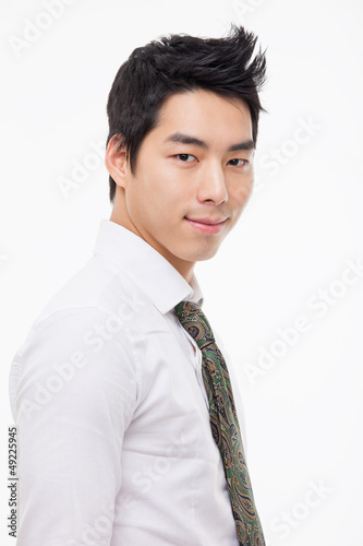 Photo: Asian young business man close up shot. Asian young business man close up shot.