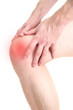 Man holding sore knee, isolated on white