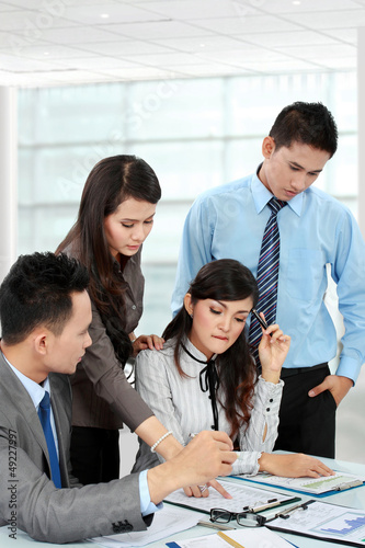 Photo: business man and woman discuss business man and woman discuss