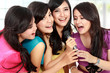 woman singing karaoke together