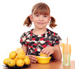 happy little girl make lemonade