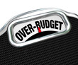 Illustration: Over-Budget Words on Scale Financial Trouble Debt Deficit Over-Budget Words on Scale Financial Trouble Debt Deficit