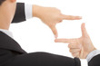 businessman making frame with hands