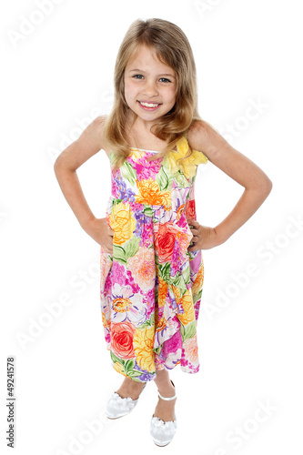 Photo: Aerial shot of trendy young girl in sleeveless frock Aerial shot of trendy young girl in sleeveless frock