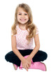 Photo: Pretty caucasian girl seated on floor Pretty caucasian girl seated on floor