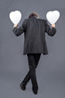 Boy with heart balloons