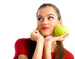 Young beautiful woman holding an apple