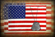 military dog tags on flag