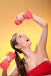 Caucasian woman with dumbbells