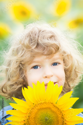 Photo: Child with sunflower Child with sunflower