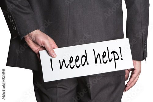 Photo: Businessman needs help Businessman needs help