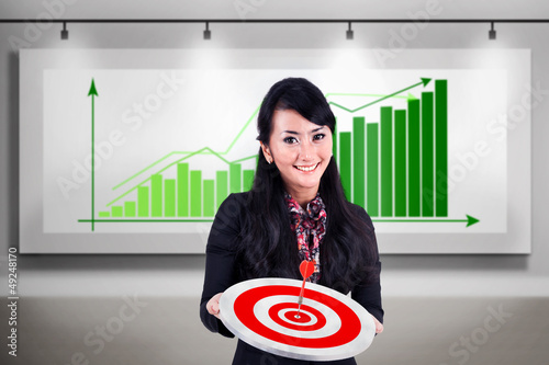 Photo: Businesswoman meet target profit sales Businesswoman meet target profit sales
