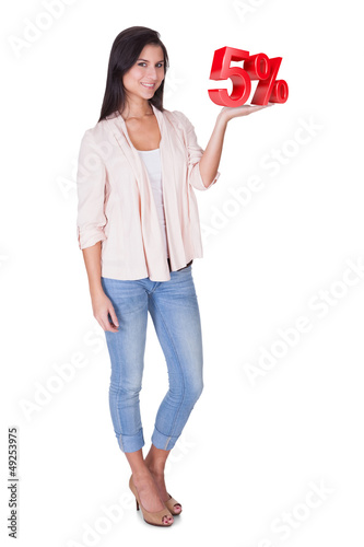 Photo: Beautiful woman holding 5% sale sign Beautiful woman holding 5% sale sign