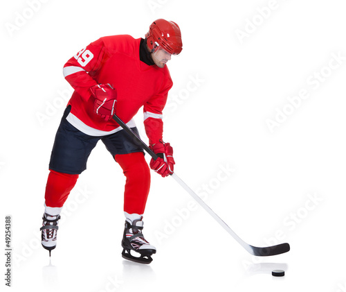 Photo: Professional hockey player skating on ice Professional hockey player skating on ice