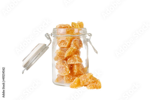 Photo: Isolated candied ginger in a jar Isolated candied ginger in a jar