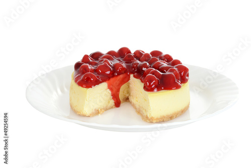 Photo: Isolated plate of cherry cheesecake Isolated plate of cherry cheesecake